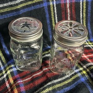 Set of Two Vintage Mason Jars with Decorative Lids